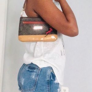 Calvin Klein mini shoulder bag. See all pictures for flaws .